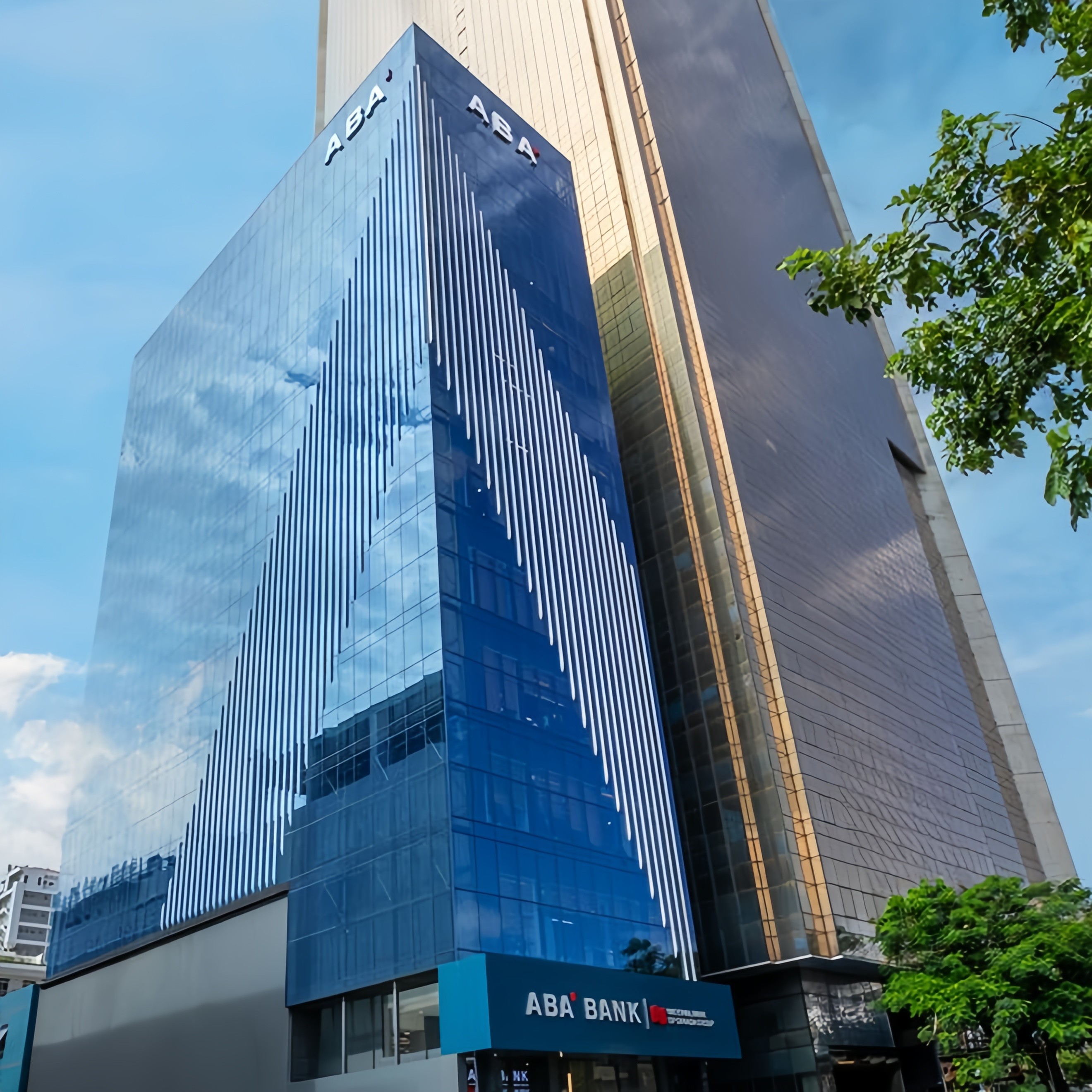ABA Bank Tower Cambodia blue glass facade and vertical architectural fins